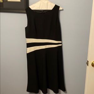 Beautiful black with cream accents cocktail dress.